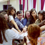photo of PACE participants in a huddle