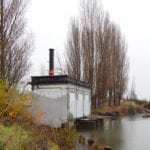 exterior of Georgetown Steam Plant Pump House next to Duwamish River