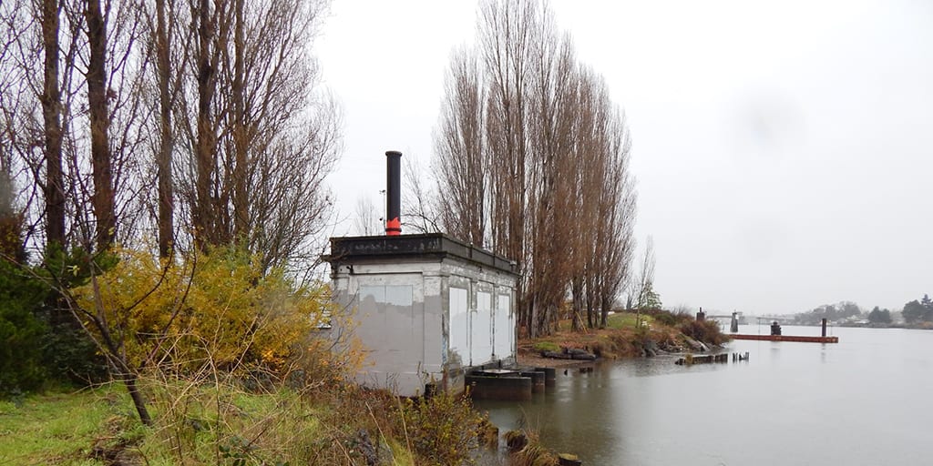exterior of Georgetown Steam Plant Pump House next to Duwamish River
