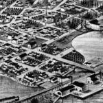 A birdseye view of Pioneer Square in 1878 with a logo in the corner that says Seattle Histories