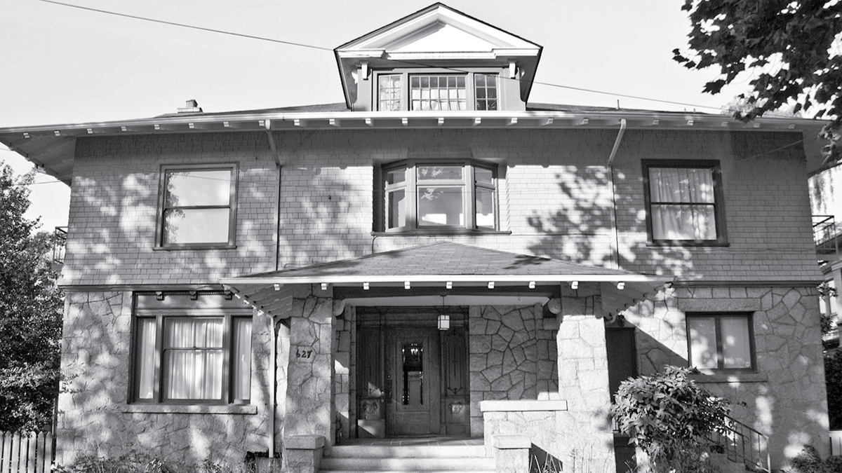 black and white photo of two-story single family home