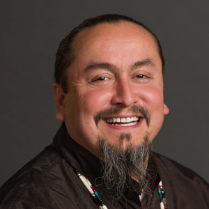 Derrick Belgarde smiling, Siletz + Chippewa-Cree, Indigenous Advisory Council Member
