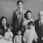 A black and white photo of a Chinese American family circa 1931