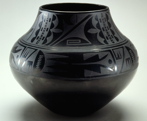 black ceramic pottery with intricate design