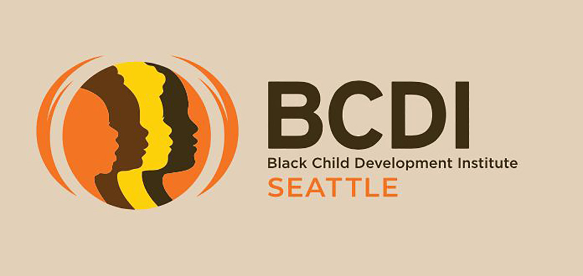 A tan background with a the profile of children's faces silhouetted in orange, brown, yellow, and black in a circle logo. Text reads "BCDI Black Child Development Institute Seattle"