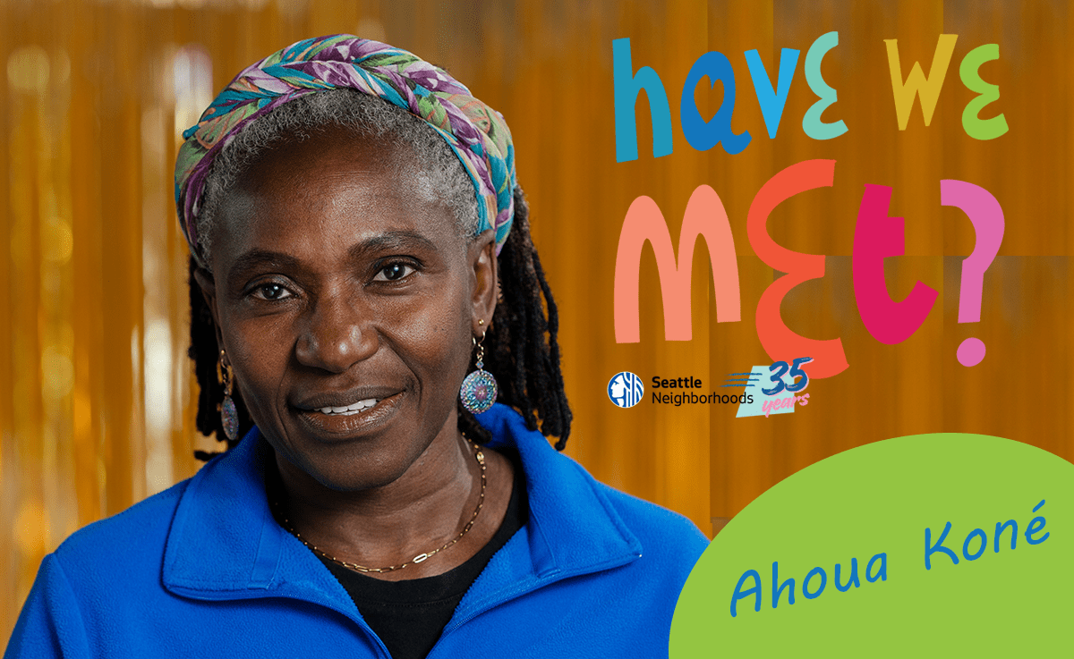 Headshot of a Black woman with a colorful headband, blue fleece shirt, and dangly earrings. Colorful text reads 